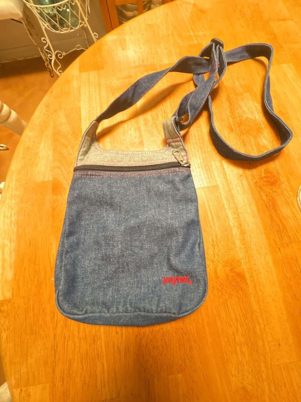 JanSport Denim Crossbody Bag with Red Stitching